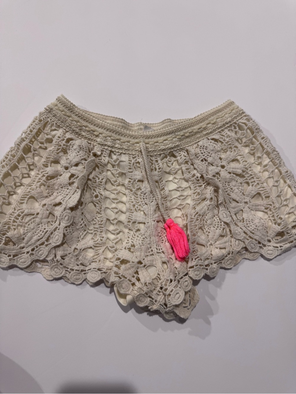 Cream Crochet-Style Shorts with Pink Tassel Drawstring